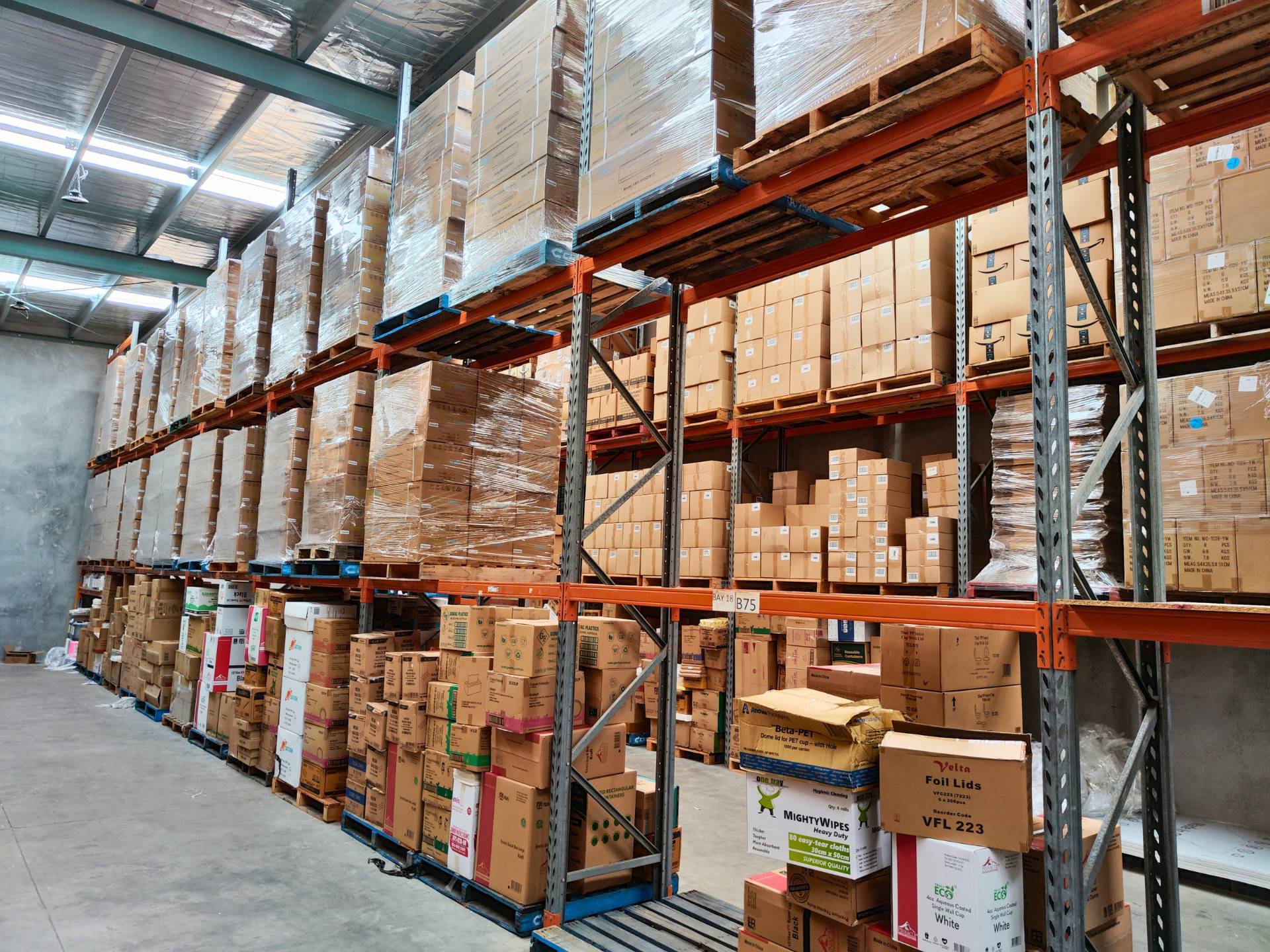 Pallets stacked on racking for storage at CRA1